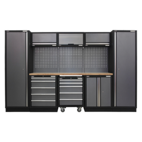 The Sealey Superline PRO® 3.2m Storage System - Wood Worktop (APMSSTACK03W) is a black and gray garage storage unit, featuring multiple drawers, cabinets, and a pegboard organized in a sleek modular design. Its tough durable construction is complemented by aluminum handles for easy access.