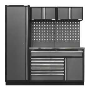 The Sealey Superline PRO® 1.96m Storage System - APMSSTACK10SS includes a tall cabinet, overhead cabinets, pegboard backsplash, multiple ball-bearing drawer slides, and a lower cabinet on the right side topped with a stainless steel worktop.