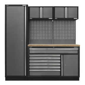 The Superline PRO® 1.96m Storage System - Pressed Wood Worktop - APMSSTACK10W by Sealey is a metal tool storage unit that includes a tall cabinet on the left, upper cabinets, a pegboard, multiple drawers, and a pressed wood worktop counter space. This heavy-duty construction comes in a dark grey finish, making it perfect for any workspace or garage.