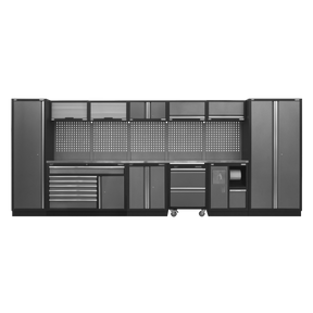 The Sealey Superline PRO® 4.9m Storage System (Model: APMSSTACK15SS) is a large, modular storage solution featuring cabinets, drawers, and a pegboard. It includes gas struts for effortless access and boasts a stainless steel worktop. This sleek industrial design combines closed doors, open shelves, and a workbench area with durable construction.