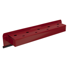 The Sealey Magnetic Screwdriver Holder - APSDH is a red metal bracket featuring multiple holes and a black lined base, designed to securely attach to any ferrous metal surface using powerful vinyl-covered magnets.
