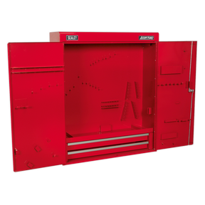 Sealey Wall Mounting Tool Cabinet - APW750 features double, lockable doors crafted from heavy gauge steel. Open to reveal an empty interior with two drawers at the bottom, numerous small holes, and various storage slots.