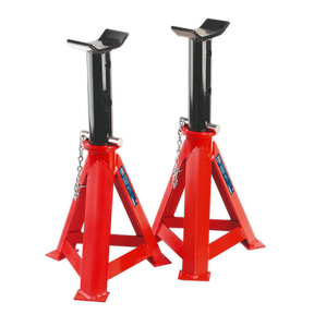The Sealey Axle Stands (Pair) 12 Tonne Capacity per Stand - AS12000 feature two red and black steel stands with triangular bases and adjustable height mechanisms, offering excellent load support and designed to meet stringent safety standards.