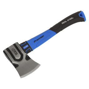 A hand axe with a blue and black handle, labeled "Premier Hand Tools" and "Real Steel," featuring a fibreglass shaft, the model number "AXG98," and "Sealey" engraved on the carbon steel head.