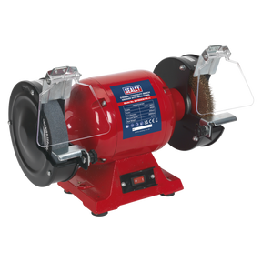 The Sealey Bench Grinder Ø150mm with Wire Wheel 450W/230V Heavy-Duty - BG150XW/99 is a red grinder equipped with a grinding wheel on the left and a wire brush wheel on the right. It features protective guards, a central power switch, and an induction motor drive for efficient workshop grinding.