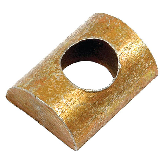 A cylindrical brass pipe with a large circular hole cut through it creates a unique semi-cylindrical object, reminiscent of the Brake Rod Spacer (Sparex Part No. S.1764) from Sparex.