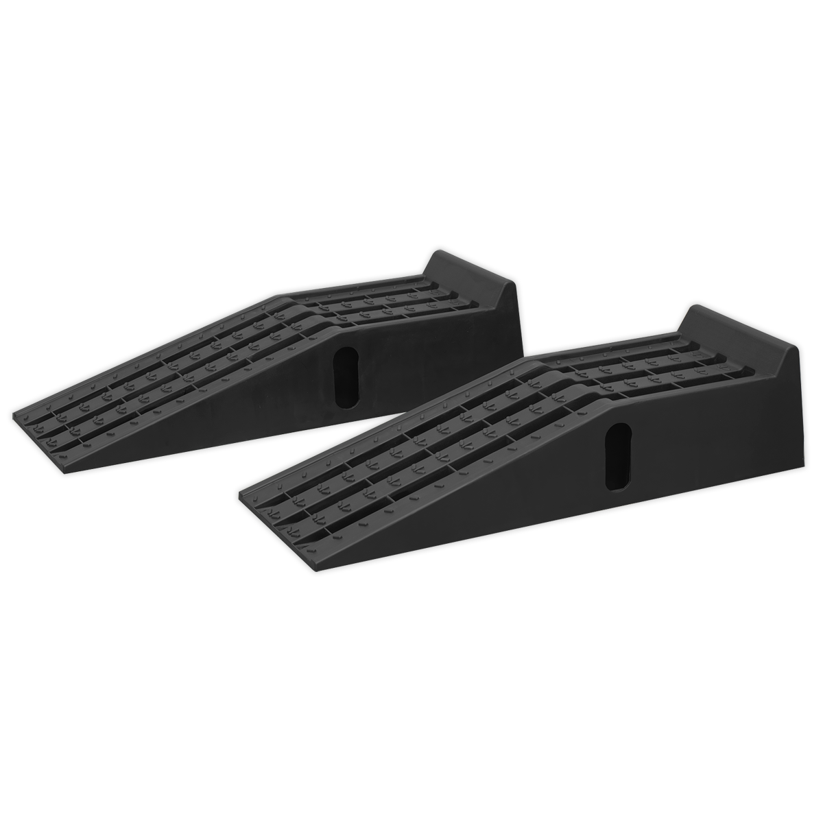 The Sealey Car Ramps CAR3000C, with a 1.5-tonne capacity per ramp (3 tonnes per pair), are black plastic with a grooved surface and handles on the sides, made from durable polypropylene, designed for lifting vehicles.