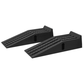 The Sealey Car Ramps CAR3000C, with a 1.5-tonne capacity per ramp (3 tonnes per pair), are black plastic with a grooved surface and handles on the sides, made from durable polypropylene, designed for lifting vehicles.