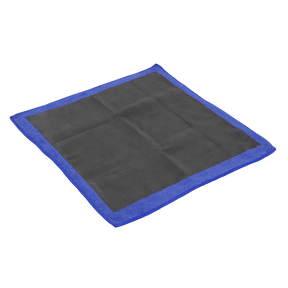 The Sealey Microfibre Clay Bar Cloth - CBC01, a square black clay-backed microfibre cloth with a blue border, is perfect when laid flat for removing surface contaminants as an alternative to traditional clay bar detailing.