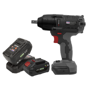 A black and grey Brushless Impact Wrench Kit 1/2" Sq Drive from the Sealey SV20 Series, featuring a red trigger, is shown next to two rechargeable 20V batteries and a charger.