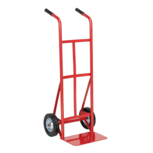 The Sack Truck with Solid Tyres 150kg Capacity - CST983 by Sealey features a red frame, black handles, and heavy-duty solid rubber wheels. Designed for effortlessly moving heavy loads, its robust tubular steel construction ensures durability and reliability.