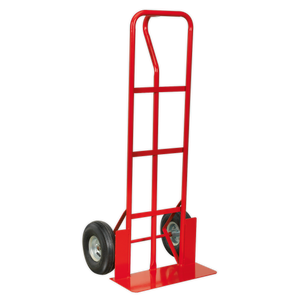 The Sealey Sack Truck Pneumatic Tyres 250kg Capacity - CST988, featuring a red steel frame and two pneumatic tires, is perfect for moving heavy objects over uneven surfaces.