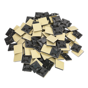 A pile of Sealey Self-Adhesive Cable Tie Mounts 25 x 25mm black (CTM2525B) with screw holes scattered randomly.