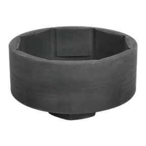 A black cylindrical high-impact socket wrench adapter with a hexagonal opening, specifically designed for Volvo commercial vehicles: the Sealey Wheel Shaft Cover Socket for Volvo 1"Sq Drive 115mm - CV006.