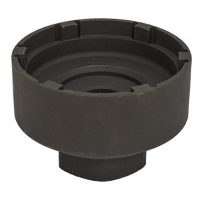 The Sealey Groove Axle Nut Socket with 6-Studs - MAN/Mercedes 3/4"Sq Drive (model CV007) is a round black metal component made from Chrome Molybdenum, featuring a hollow center and multiple slots around the upper edge.