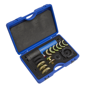 A blue plastic carrying case containing Sealey's Hydraulic Bush Tool - Commercial - CV040, along with various automotive tools and several circular metal attachments for slotted bush installation.