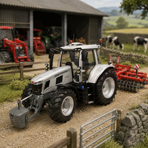 A silver and black tractor with a front attachment is shown in a detailed farm setting with a barn, other tractors, a red plow, and cows in the background.