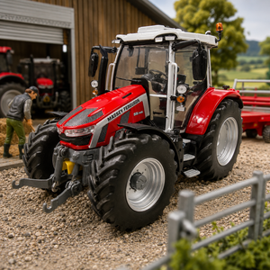 A red and white Massey Ferguson tractor toy or model is parked on a gravel farm setting with a wooden barn, another tractor, and a person visible in the background.