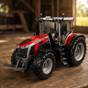 A red, black, and white toy tractor model with 'MAGNET FERGUSON' branding, displayed on a rustic wooden surface with a blurred barn background.