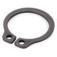 An 18mm external metal circlip with two small circular holes on either side from AGCO's Massey Ferguson range (390981X1).
