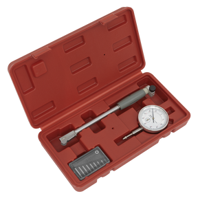 A red plastic case containing the Sealey Dial Bore Gauge 18-35mm (DBG508) with various attachments and a precision mechanism dial indicator for superior accuracy.