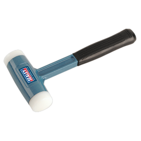 A rubber mallet with a blue and black design, featuring a textured handle for improved grip and dual durable nylon faces, branded with "Sealey" from Premier Hand Tools is visible on the head. This specific model is known as the Dead Blow Hammer 2.5lb Nylon Faced - DBHN275.