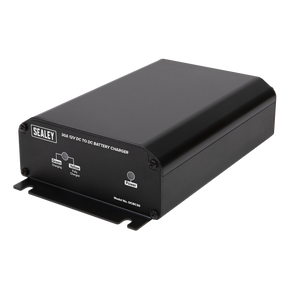 A black Sealey DC to DC battery charger, model number DCBC30, capable of 30A at 12V, features an ignition switch and a front panel with three indicator lights labeled "Battery Charging," "Battery Charged," and "Power." Ideal for charging an auxiliary battery.