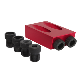 The Sealey Dowelling Jig Set 7pc Angled Pocket - DJ02 includes a red metal block featuring two holes, along with five black threaded cylindrical pieces, perfect for use with a pocket-sized dowel jig.