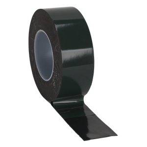 A partial roll of Sealey's Double-Sided Adhesive Foam Tape (50mm x 10m) with green backing, product DSTG5010, displayed on a white background.