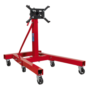 The Sealey Folding Engine Stand 900kg - ES900F features adjustable mounting arms, six caster wheels that allow mobility on concrete surfaces, and foldable legs for convenient storage.