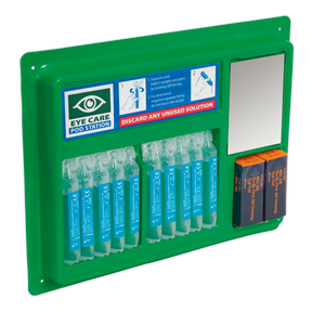 The Sealey Eye/Wound Wash Station - EWS02, a green wall-mounted eye care pod station with saline solution pods, features instructions and a shatterproof mirror on the right side for addressing eye and wound hazards.