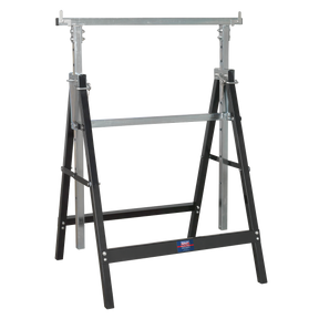 The Sealey Fold Down Telescopic Trestle 200kg Capacity - FDT3 features adjustable-height legs, a black lower frame, and a silver upper steel tube frame, with a small Sealey brand label on the lower crossbar.