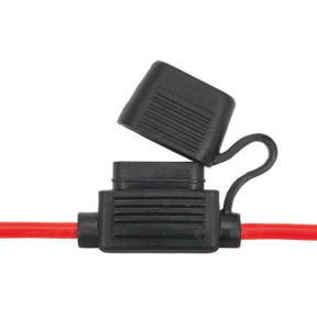 Close-up of a Sealey Standard Blade Fuse Holder Splashproof 30A - FHSP30 with an open cover, connected to a red wire. This pack of 10 holders is compatible with standard blade fuses.