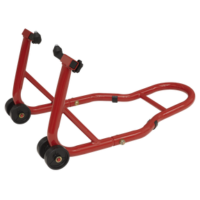 The Sealey Paddock Stand Front Fork - FPS1KD is a red rear motorcycle wheel stand equipped with black rubber wheels, designed for maintenance and storage. It features width adjustment to accommodate various bike models and provides rim protection.