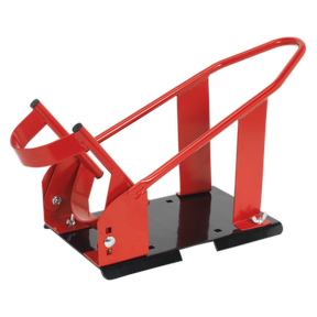 The Sealey FPS6 Motorcycle Front Wheel Chock, available in red and black metal, is designed for securing the front wheel of a motorcycle and features an adjustable pivoting wheel guide suitable for tire widths of 90-130mm.