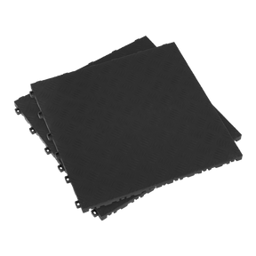 Three stacked **Sealey Polypropylene Floor Tile 400 x 400mm** with a textured diamond treadplate pattern and an anti-slip surface, ideal for a garage environment.