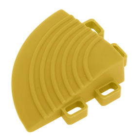 A polypropelene floor tile corner piece from Sealey, model FT3CY, is shown against a white background. This yellow 60 x 60mm curved plastic piece features three square slots and raised ridges, characteristic of components frequently found in polypropylene floor tiles.