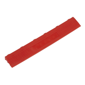 A long, rectangular red plastic toy brick is shown, featuring interlocking ridges on the top and smooth surfaces on the sides, reminiscent of Sealey's Polypropylene Floor Tile Edge 400 x 60mm Red Female - Pack of 6 (FT3ERF).