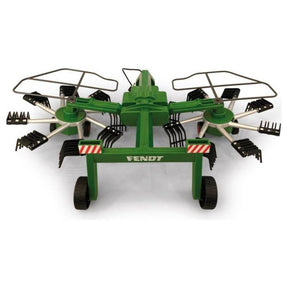 The green agricultural machine, branded "AGCO Fendt Former," features multiple rotating rake arms and tines for collecting and turning hay or straw, with radio-controlled capabilities for enhanced ease of use. The full product designation is AGCO Fendt Former Radio Control - X991018291000.