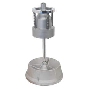 The Wheel Balancer - Manual - GA10 by Sealey is a silver industrial machine part featuring a cylindrical body, supported by a vertical rod and mounted on a conical base for balancing wheels.