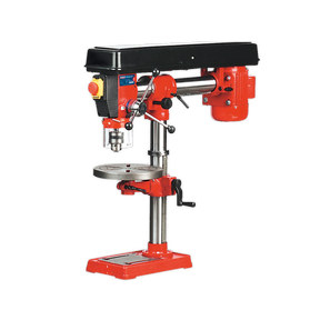 The Sealey Radial Pillar Drill Bench 5-Speed 820mm Height 550W/230V - GDM790BR is a red and black machine featuring a rotating handle, an adjustable table, and a drill bit. Its heavy-duty construction and radial design ensure precise drilling tasks.