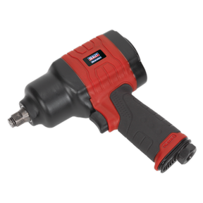The Sealey Composite Air Impact Wrench 1/2"Sq Drive - Twin Hammer (GSA6002) features a striking black and red design with a textured grip handle and a durable metal square drive. Its robust construction guarantees maximum breakaway torque, perfect for tackling heavy-duty tasks. Displayed against a white background, its industrial strength is unmistakably clear.