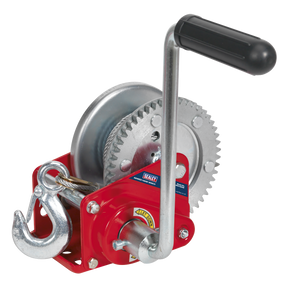The Sealey Geared Hand Winch with Brake & Cable 540kg Capacity - GWC1200B, featuring a hardened steel gear, metallic hook, black handle, and an automatic brake system, is ideal for recovery operations.