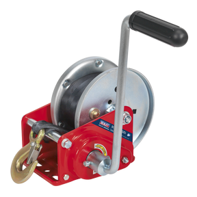 The Sealey Geared Hand Winch with Brake & Webbing 900kg Capacity - GWW2000B features a black handle, red base, metal drum, and a hook attached to a strap. With its hardened steel gear for enhanced durability, it is ideal for recovery operations.