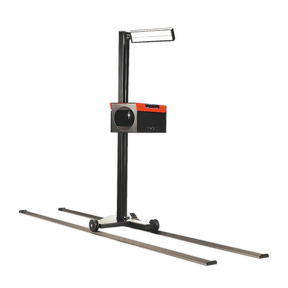 Image of a modern Headlamp Beam Setter with Rails & Commercial Aiming Screen, HBS97.HGV by Sealey, featuring two long supporting arms and a prominent control unit. This HGV certified device boasts a vertical pole with an attached light for better visibility, making it ideal for use in MOT test stations.