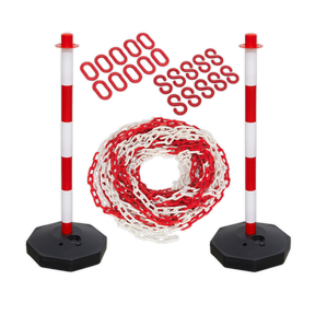 Two red and white striped stanchions from the Sealey Exclusion Zone Extension Kit - HP55KECOMBO, connected by a safety chain with plastic chain connectors, are arranged against a plain background.