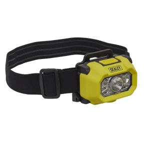 This Sealey head torch, model HT452IS, is yellow and black and features a high-power SMD LED flashlight, an adjustable black head strap, and a single large light in the center. It is also Intrinsically Safe ATEX/IECEx approved for added safety.