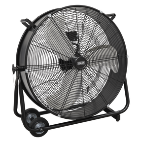 The Sealey Industrial High Velocity Drum Fan 24" 230V - HVD24 features a 2-speed option, heavy-duty steel casing with metal grates, and three blades. The Sealey label is positioned at the center. This high-velocity drum fan includes a robust black frame with wheels for mobility and a handle for easy transport.