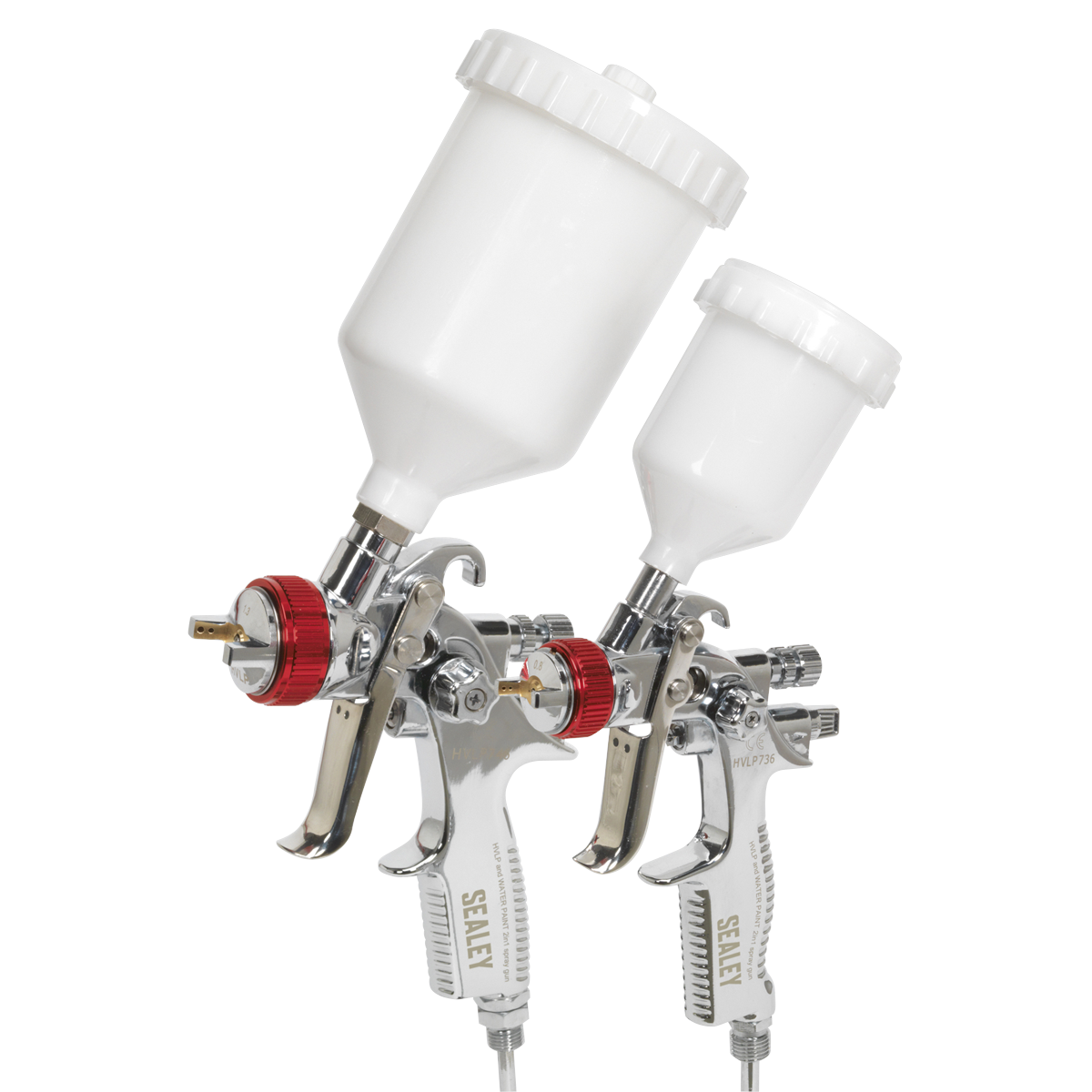 Two metal HVLP spray guns from the "Sealey" brand, featuring white plastic containers, are positioned side by side. The larger gravity feed spray gun is in front, and the smaller one is behind it. Both models feature red adjustment knobs and durable stainless steel needles, as part of the "HVLP Gravity Feed Top Coat/Touch-Up Spray Gun Set - HVLP774.