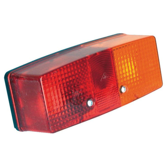 A rectangular vehicle tail light with a red and orange lens, featuring a textured surface and two visible screws, compliant with E Approved standards is known as the Rear Combination Light (Halogen) by Sparex. It functions as a brake, tail, and indicator light for the right-hand side, suitable for 12/24V - S.56106.